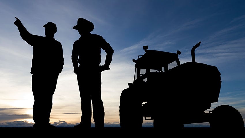 two-farmers-by-tractor-850.jpg