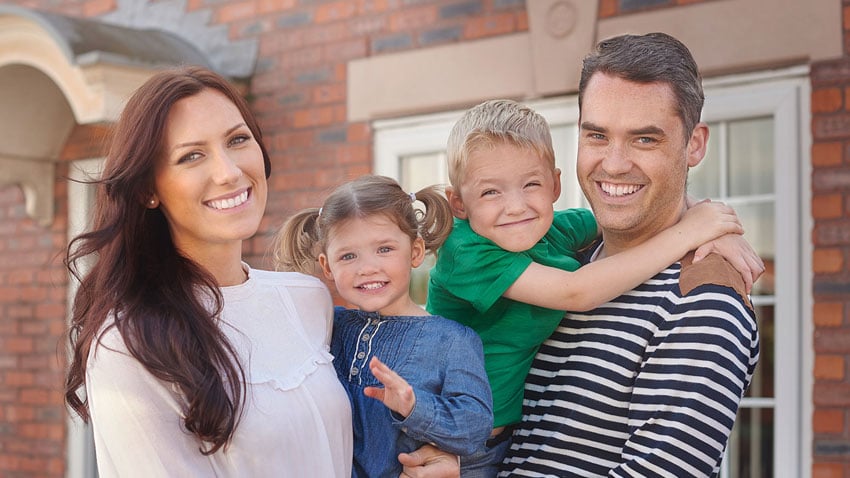 Family-in-Front-of-Home-SMALL