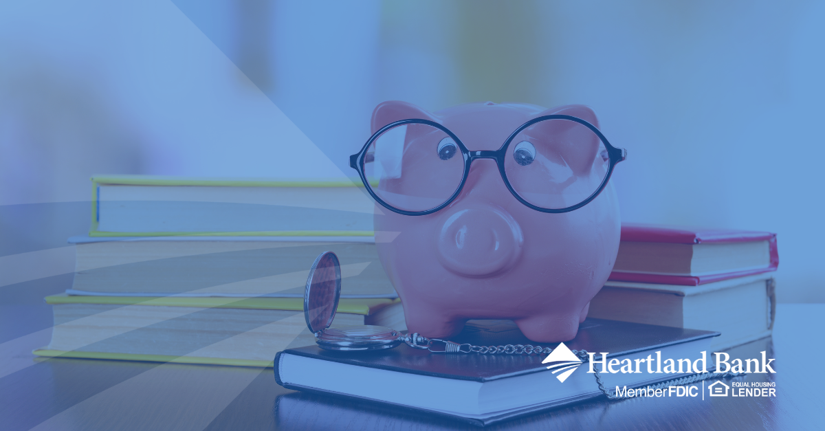 piggy bank sitting on books