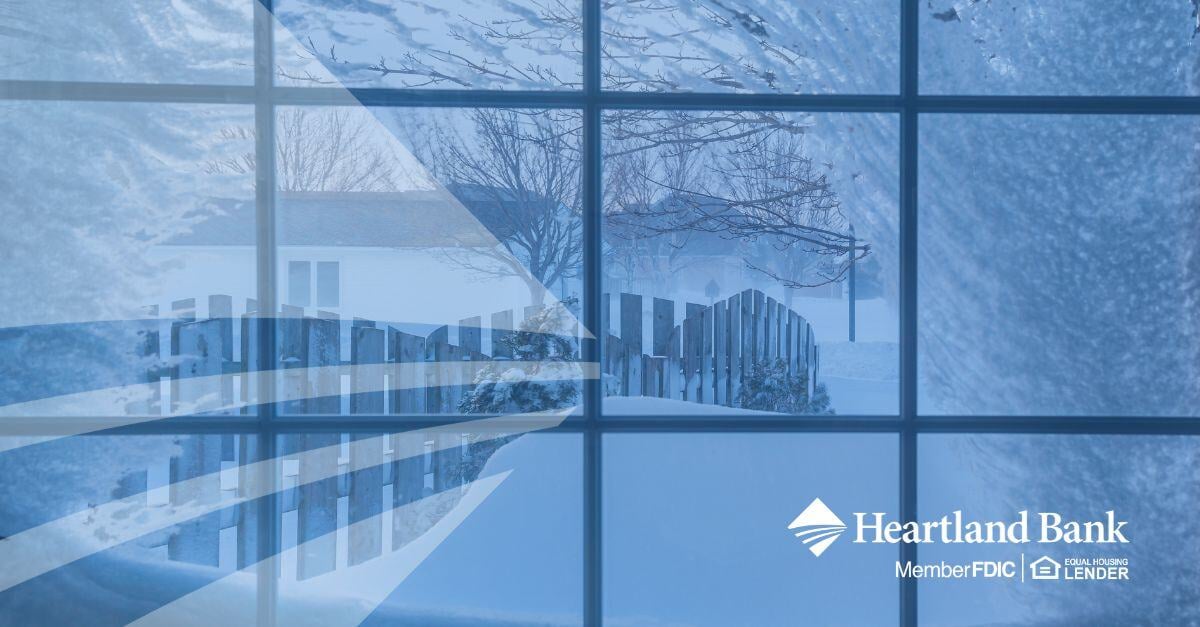 looking out a window into a snowy backyard