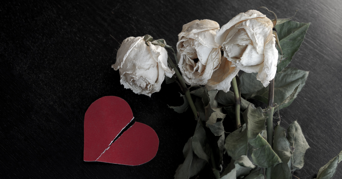 broken heart and wilting flowers