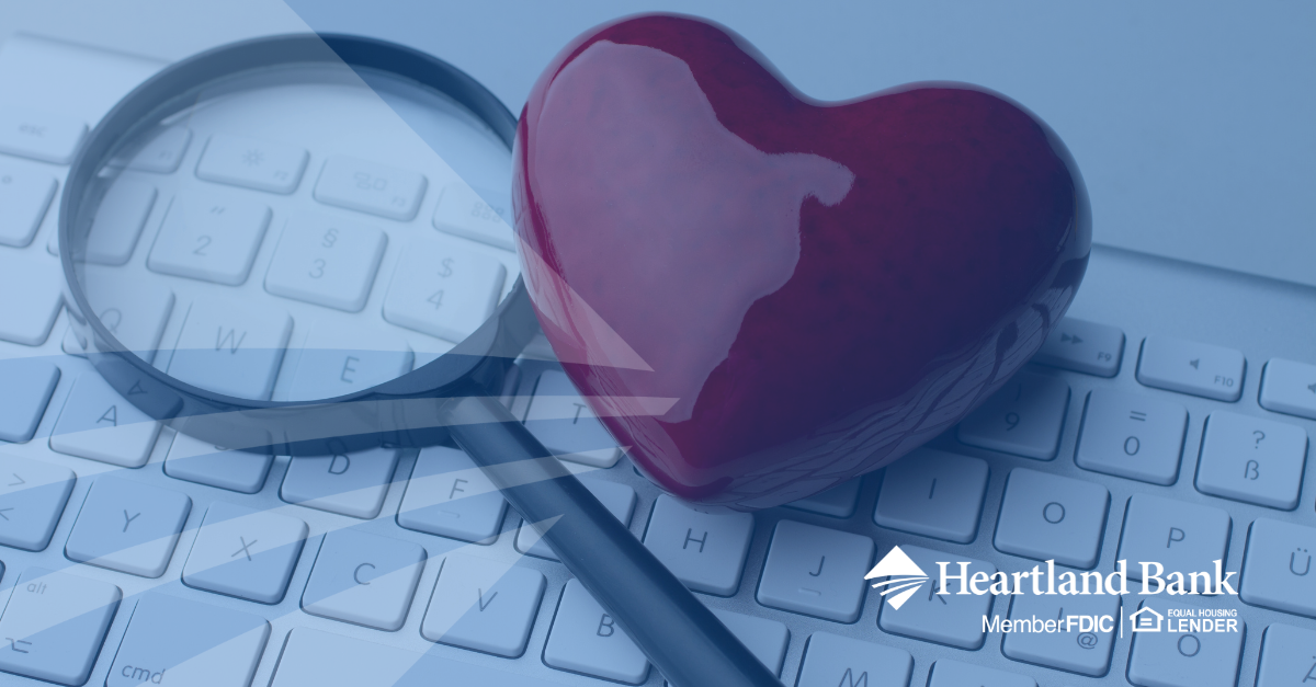 Keyboard with magnifying glass and heart 