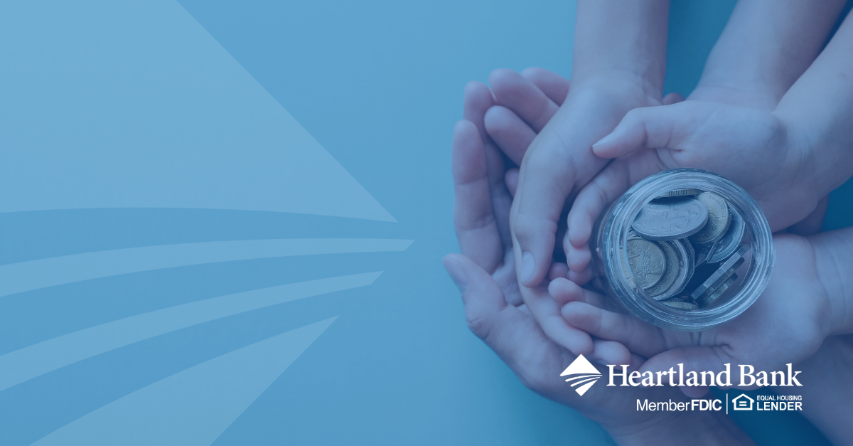 Big and small hands holding jar of coins